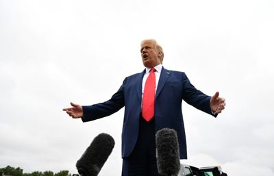 Men in black? Dark shadows? Trump hits full conspiracy theory mode