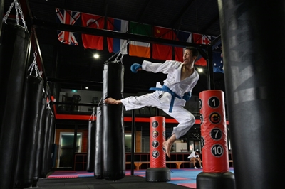 Bruce Lee, life of hardship inspire refugee's Tokyo Olympics dream