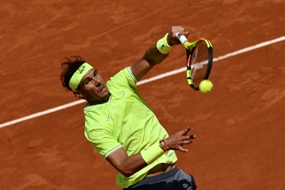 Nadal marches into Roland Garros third round