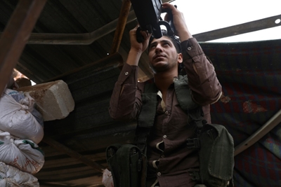 Most heavy arms out of planned Syria buffer zone