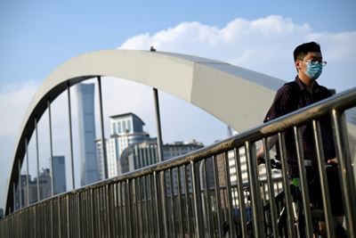 China downplays potential new swine flu pandemic