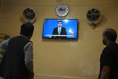 Top Afghan TV network stays on-air despite fear of Taliban