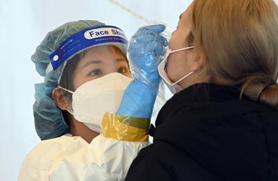 South Korea to reimpose business curfews to battle Covid surge