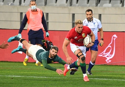 Farrell seals Lions' victory in bruising battle with Springboks