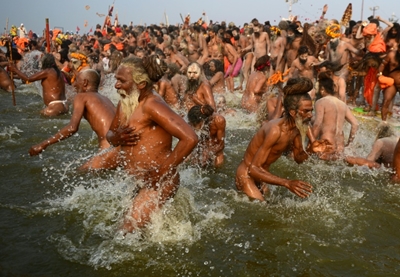Millions take the plunge at India's religious mega festival