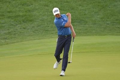 English wins eight-hole playoff to take PGA Travelers title