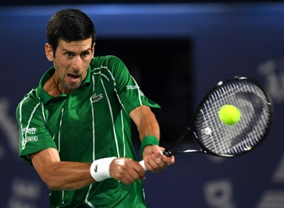 Djokovic continues hot streak to cruise into second round in Dubai