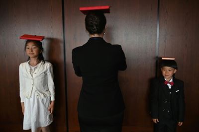 Children of Chinese elite walk red line to 'perfection'