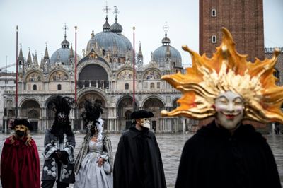 Venice still magical  as tourist-free carnival kicks off