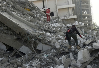 Relatives desperate for news after Lagos building collapse