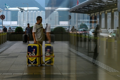Hong Kong airport protesters retreat, but city in turmoil