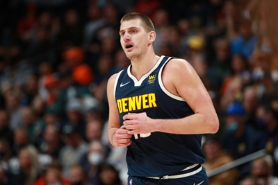 Booed Jokic leads Nuggets past short-handed Heat