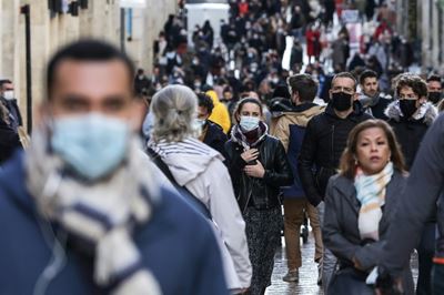 France eases Covid curbs, including outdoor mask-wearing