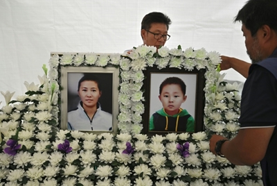 North Korean defector mothers struggle in South