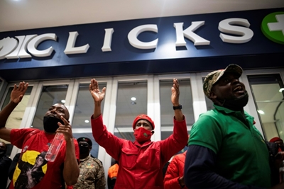 Protests over 'racist' ads shut hundreds of South Africa pharmacies 