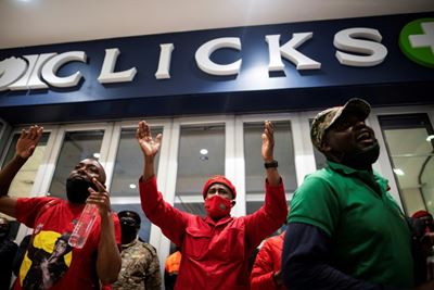 Protests over 'racist' ads shut hundreds of South Africa pharmacies 