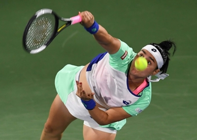 Halep downs battling Jabeur on fourth match point in Dubai