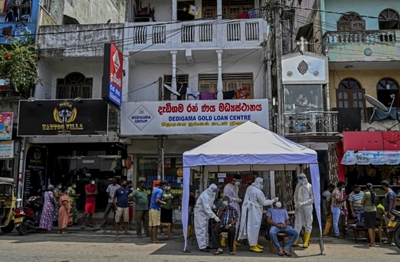 India's neighbours close borders over virus rampage