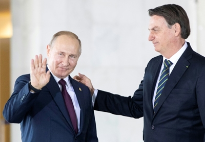 Bolsonaro beams as Putin praises his 'masculinity'