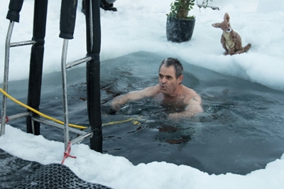 Antarctic researchers mark winter solstice with icy plunge