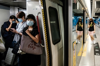 Hong Kong leader says coronavirus 'critical' after 100 new cases