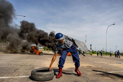 Zimbabwe police fire tear gas as crackdown tightens