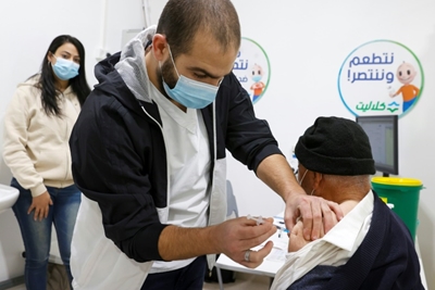 Israel premier calls for vaccination push in Arab communities