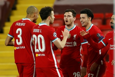 Liverpool advance in Champions League, Real Madrid defeat heaps pressure on Zidane