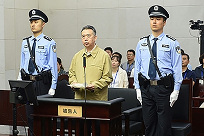 China's former Interpol chief sentenced to 13 years in prison