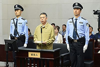 China's former Interpol chief sentenced to 13 years in prison