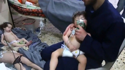 France freezes company assets over Syria chemical weapons