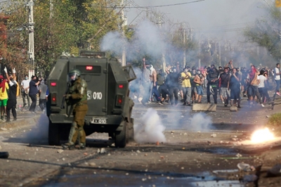 Chile virus cases soar as soldiers deploy following unrest