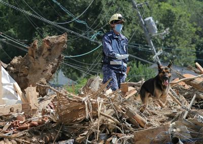 Japan tackles clean-up as rains toll tops 200