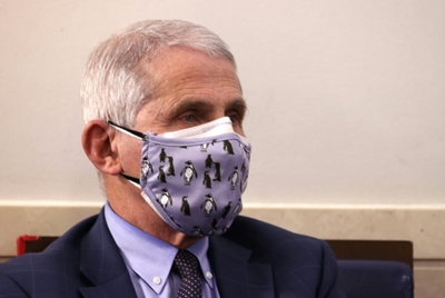 Fauci warns Americans to brace for 'surge upon surge' of virus