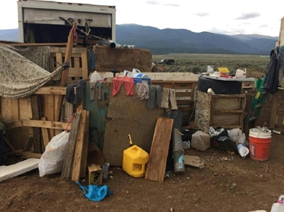 US police find body of boy at raided camp