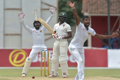 Embuldeniya strikes as Zimbabwe bowled out for 406