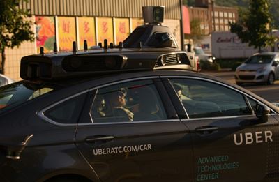 Toyota pours $500 mn into driverless car tie-up with Uber