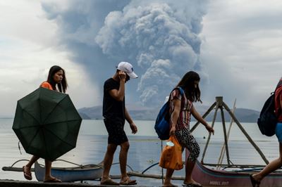 Thousands face uncertainty as Philippine volcano spews lava
