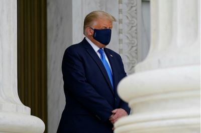 Trump heckled as he pays respects to late justice Ginsburg