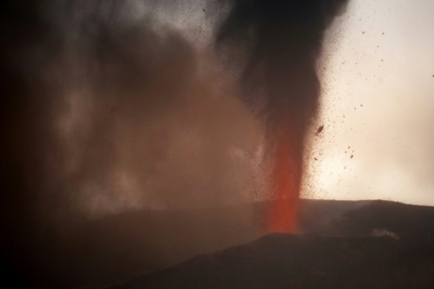 Canaries volcano razes hundreds of buildings as lava creeps to sea