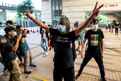 Hong Kong judges say prison staff wrong to cut dissident's hair