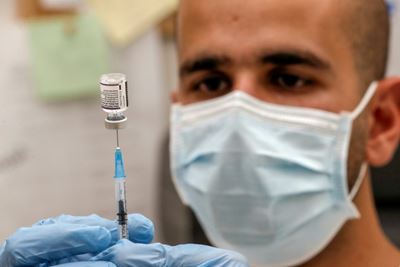Israel booster jabs cutting severe Covid even as cases surge: experts