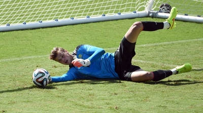 Australia keeper Langerak tests positive for COVID-19 in Japan