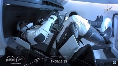 SpaceX Crew Dragon docks with International Space Station
