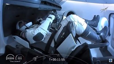 SpaceX Crew Dragon docks with International Space Station