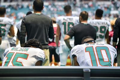 NFL kneeling protests resume as Trump warns of ratings fall