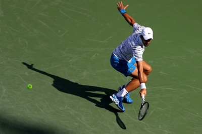 Federer, Djokovic advance as Serena pulls out in Cincinnati