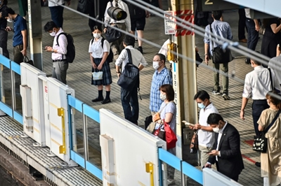 Japan economy shrinks record 7.8% in April-June