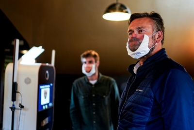 Printed masks put smile on Belgian faces as lockdown ends