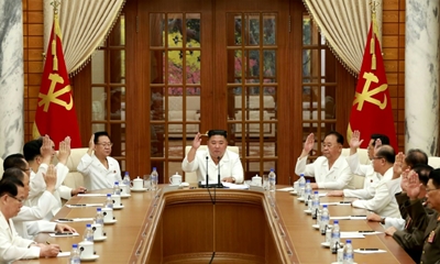 N. Korea's Kim issues warning on virus as health speculation swirls